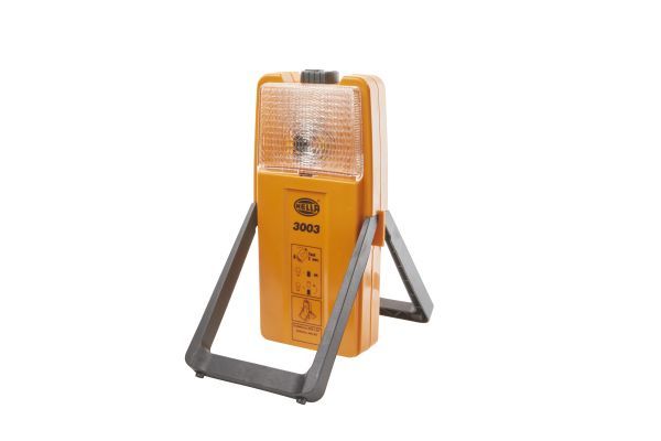 HELLA 2XW 007 146-001 Kombinierte Warnblink- und Arbeitsleuchte mit schwarzem Befestigungshalter. Lichtscheibe für Warnblinklicht gelb. Arbeitslicht weiß. Durch Betätigen des Schalters oberhalb mit Glühlampe
